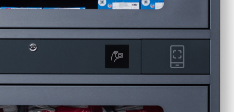 Close-up of a front panel where is an icon of a NFC reader and graphic element of a smartphone.