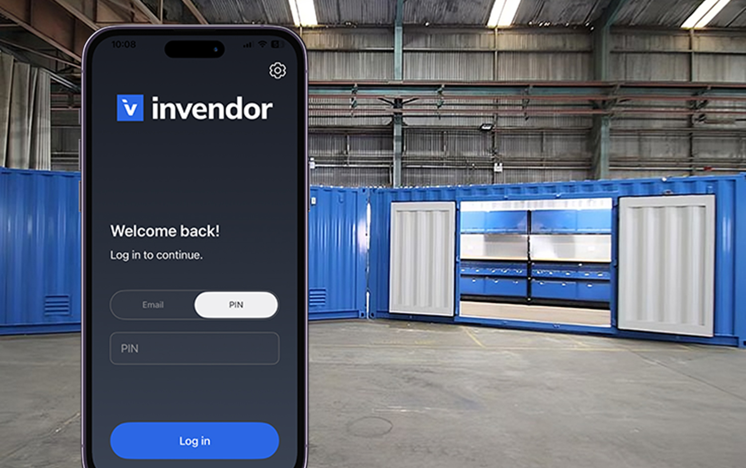 In the front is a smartphone displaying Invendor app login, in the background are seacontainers in an industrial environment.