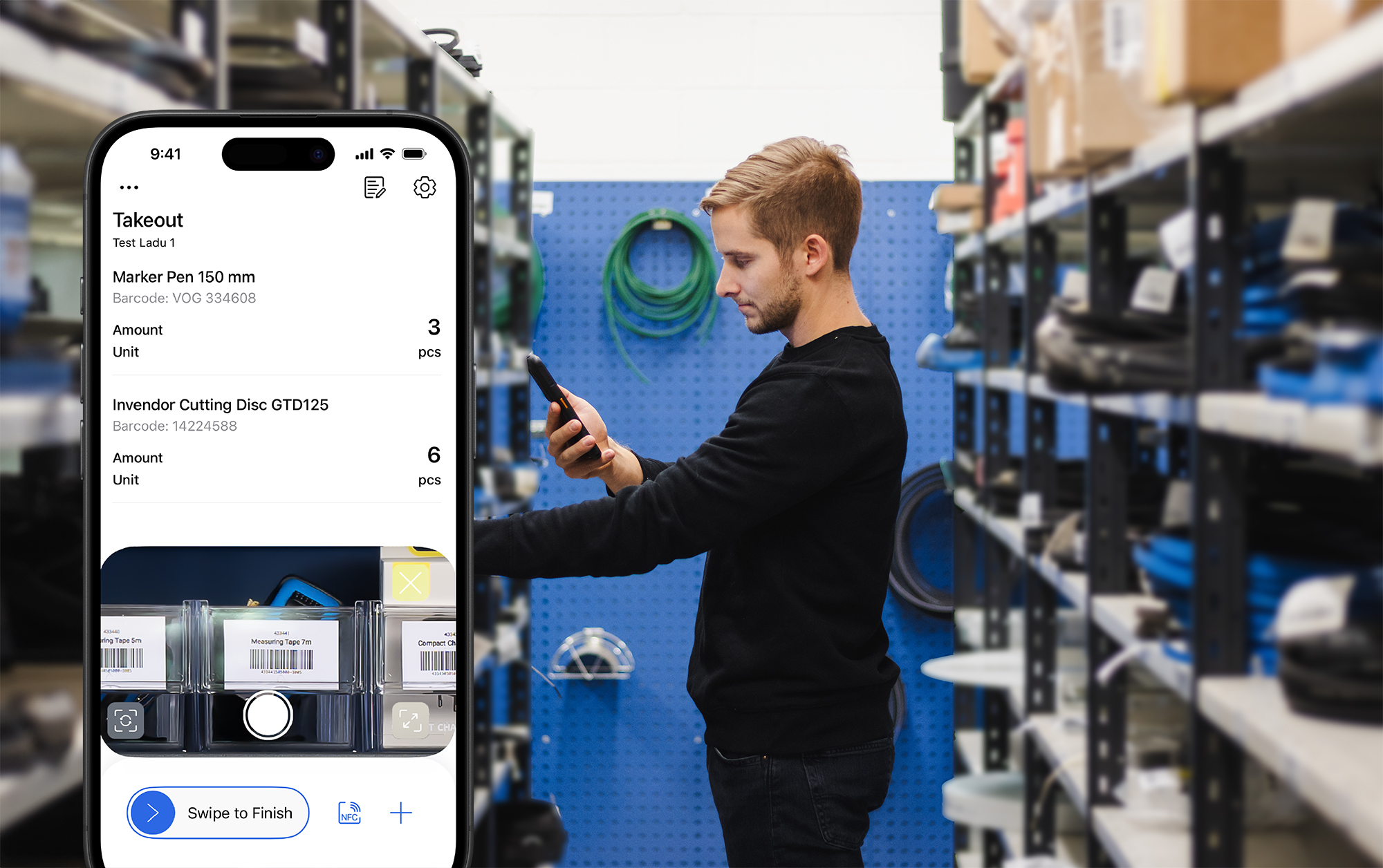 Man using an inventory app on his phone in a warehouse, with a smartphone screen in the foreground displaying items taken out and their details.