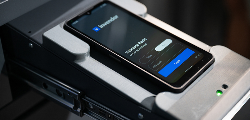 Close-up of a smart-device inside a shelf