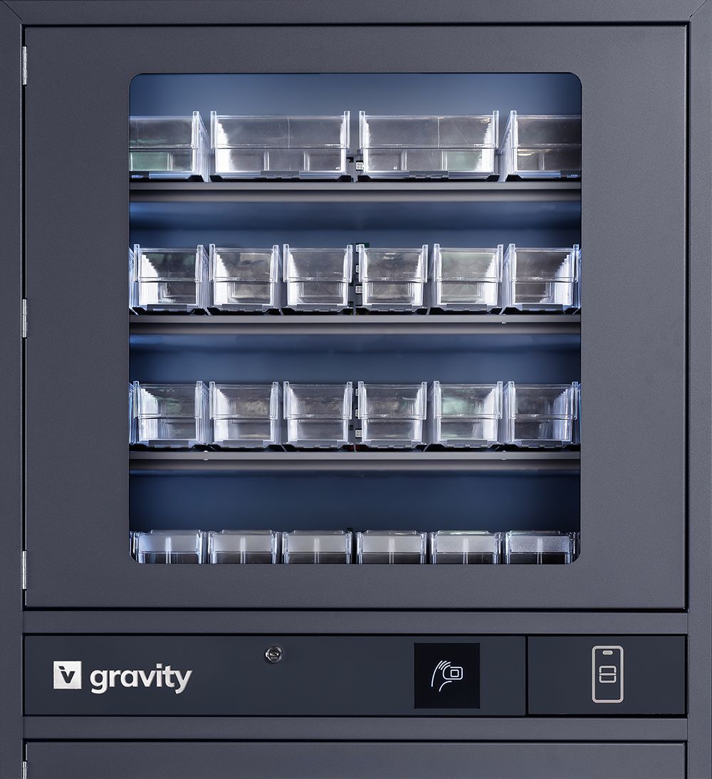 Gray storage cabinet with transparent shelves, branded 'Capture,' featuring icons for card access and lock functionality on the control panel.